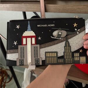 Michael Kors Black Wristlet with Multicolor City Skyline Appliqué